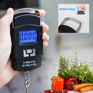 Hand holding digital hanging scale to weigh groceries