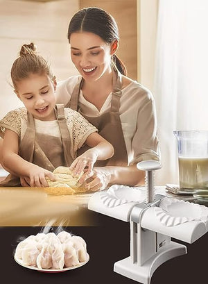 Mother and daughter making dumplings together with the double head dumpling maker