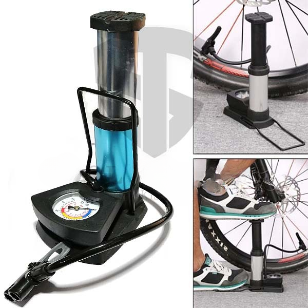 Foot air pump being used to inflate a bicycle tire
